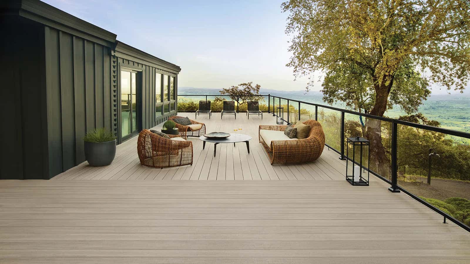 TimberTech deck with light boards, outdoor seating and a black perimeter railing